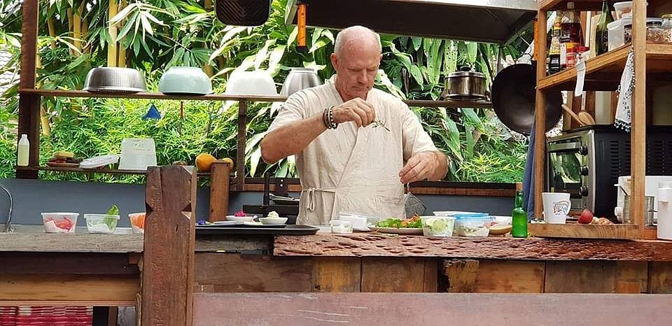Chris cooking at Simple Pleasures Café